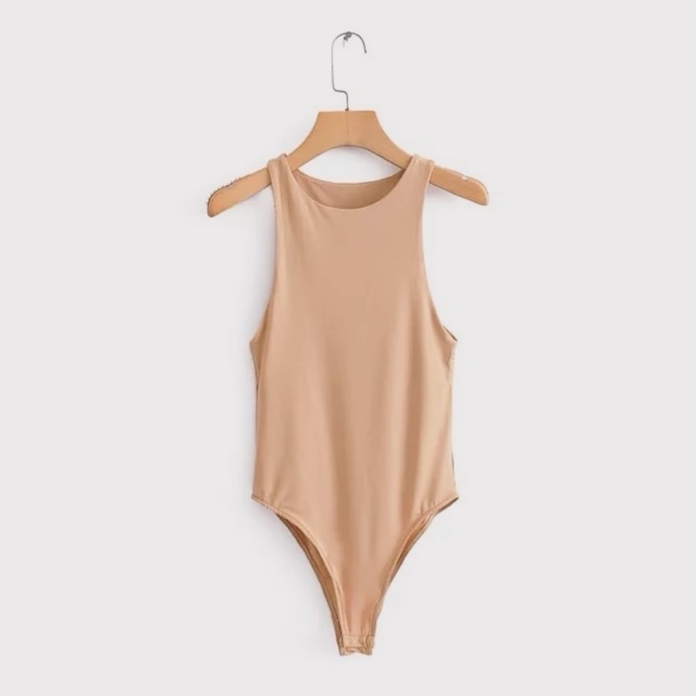 Boutique Bodysuit – NEW
- Available in small, medium, large